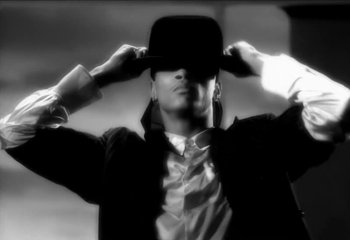 Movie still from “Madonna - Vogue” (1990), directed by David Fincher – Extreme Close Up shot, Low angle