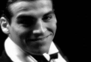 Movie still from “Madonna - Vogue” (1990), directed by David Fincher – Extreme Close Up shot, High angle