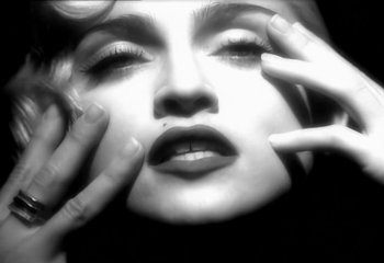Movie still from “Madonna - Vogue” (1990), directed by David Fincher – Extreme Close Up shot, Overhead angle