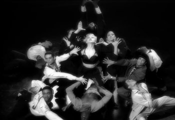 Movie still from “Madonna - Vogue” (1990), directed by David Fincher – Wide shot, Overhead angle