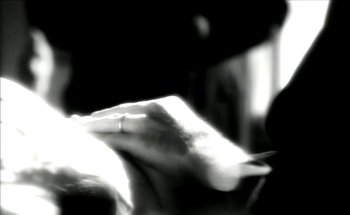 Movie still from “Madonna - Oh Father” (1989), directed by David Fincher – Extreme Close Up shot, High angle