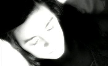 Movie still from “Madonna - Oh Father” (1989), directed by David Fincher – Extreme Close Up shot, Overhead angle