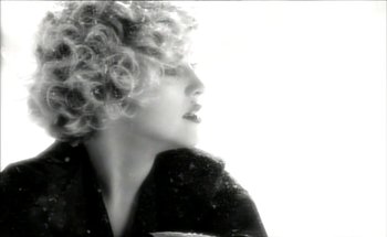 Movie still from “Madonna - Oh Father” (1989), directed by David Fincher – Extreme Close Up shot, Low angle