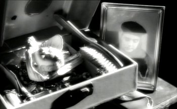 Movie still from “Madonna - Oh Father” (1989), directed by David Fincher – Extreme Close Up shot, High angle