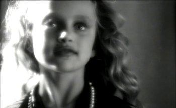 Movie still from “Madonna - Oh Father” (1989), directed by David Fincher – Extreme Close Up shot, High angle
