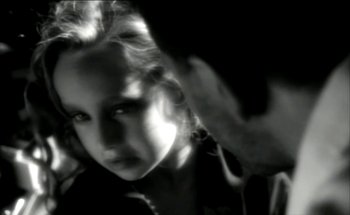 Movie still from “Madonna - Oh Father” (1989), directed by David Fincher – Extreme Close Up shot, High angle