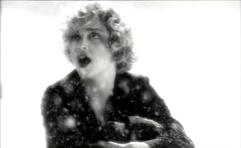 Movie still from “Madonna - Oh Father” (1989), directed by David Fincher – Extreme Close Up shot, Low angle