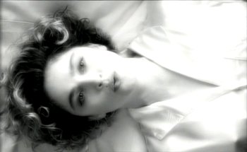 Movie still from “Madonna - Oh Father” (1989), directed by David Fincher – Close Up shot, Overhead angle