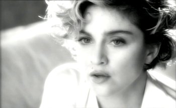 Movie still from “Madonna - Oh Father” (1989), directed by David Fincher – Extreme Close Up shot, Over the shoulder angle