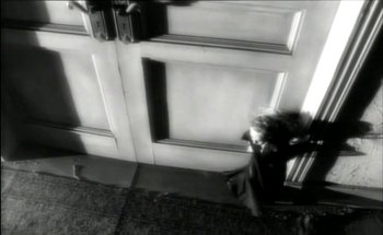 Movie still from “Madonna - Oh Father” (1989), directed by David Fincher – Extreme Close Up shot, High angle