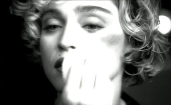 Movie still from “Madonna - Oh Father” (1989), directed by David Fincher – Extreme Close Up shot, Low angle