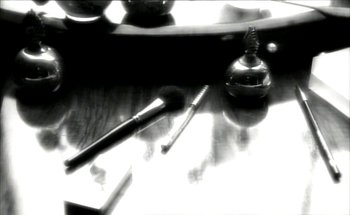 Movie still from “Madonna - Oh Father” (1989), directed by David Fincher – Extreme Close Up shot, Overhead angle