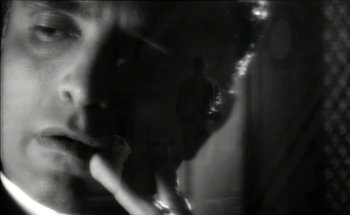 Movie still from “Madonna - Oh Father” (1989), directed by David Fincher – Extreme Close Up shot, Low angle