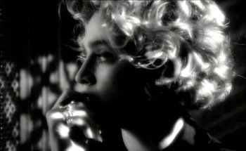 Movie still from “Madonna - Oh Father” (1989), directed by David Fincher – Extreme Close Up shot, High angle