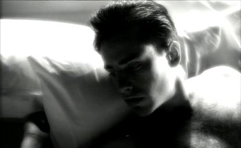Movie still from “Madonna - Oh Father” (1989), directed by David Fincher – Close Up shot, Low angle