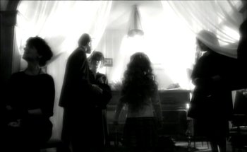 Movie still from “Madonna - Oh Father” (1989), directed by David Fincher – Wide shot, Low angle