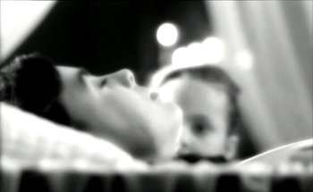 Movie still from “Madonna - Oh Father” (1989), directed by David Fincher – Extreme Close Up shot, Low angle