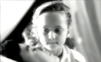 Movie still from “Madonna - Oh Father” (1989), directed by David Fincher – Extreme Close Up shot, High angle