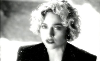 Movie still from “Madonna - Oh Father” (1989), directed by David Fincher – Close Up shot, Low angle
