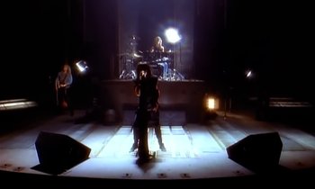 Movie still from “Aerosmith - Janie’s Got A Gun” (1989), directed by David Fincher – Wide shot, High angle