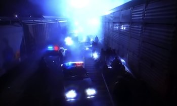 Movie still from “Aerosmith - Janie’s Got A Gun” (1989), directed by David Fincher – Extreme Wide shot, Overhead angle