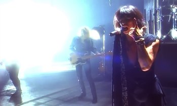 Movie still from “Aerosmith - Janie’s Got A Gun” (1989), directed by David Fincher – Medium shot, Low angle