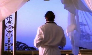 Movie still from “Aerosmith - Janie’s Got A Gun” (1989), directed by David Fincher – Medium shot, Low angle