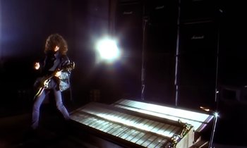 Movie still from “Aerosmith - Janie’s Got A Gun” (1989), directed by David Fincher – Wide shot, Low angle