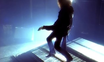 Movie still from “Aerosmith - Janie’s Got A Gun” (1989), directed by David Fincher – Medium shot, Overhead angle