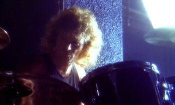 Movie still from “Aerosmith - Janie’s Got A Gun” (1989), directed by David Fincher – Close Up shot, Over the shoulder angle