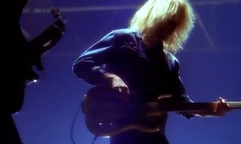 Movie still from “Aerosmith - Janie’s Got A Gun” (1989), directed by David Fincher – Medium shot, Low angle