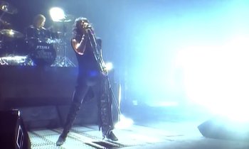 Movie still from “Aerosmith - Janie’s Got A Gun” (1989), directed by David Fincher – Wide shot, Low angle