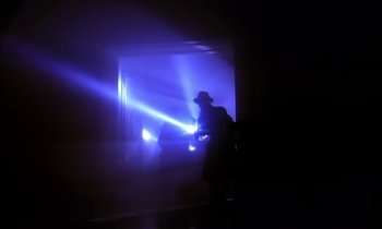 Movie still from “Aerosmith - Janie’s Got A Gun” (1989), directed by David Fincher – Wide shot, Low angle