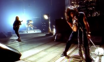 Movie still from “Aerosmith - Janie’s Got A Gun” (1989), directed by David Fincher – Wide shot, Low angle