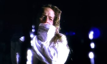 Movie still from “Aerosmith - Janie’s Got A Gun” (1989), directed by David Fincher – Close Up shot, Over the shoulder angle