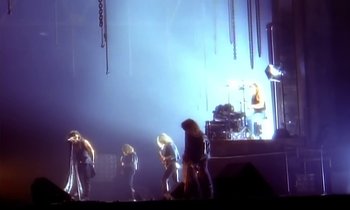 Movie still from “Aerosmith - Janie’s Got A Gun” (1989), directed by David Fincher – Wide shot, High angle