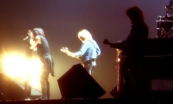 Movie still from “Aerosmith - Janie’s Got A Gun” (1989), directed by David Fincher – Wide shot, Over the shoulder angle