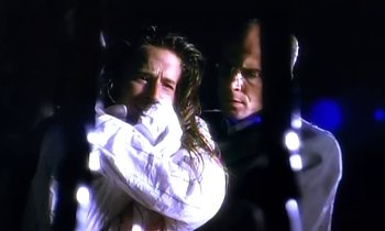 Movie still from “Aerosmith - Janie’s Got A Gun” (1989), directed by David Fincher – Close Up shot, Over the shoulder angle