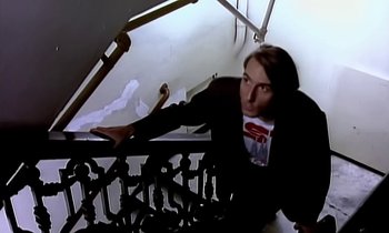 Movie still from “Paula Abdul - Cold Hearted” (1989), directed by David Fincher – Medium shot, Overhead angle