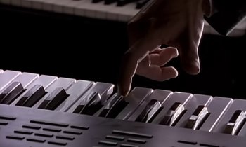 Movie still from “Paula Abdul - Cold Hearted” (1989), directed by David Fincher – Extreme Close Up shot, Overhead angle