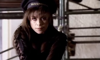 Movie still from “Paula Abdul - Cold Hearted” (1989), directed by David Fincher – Close Up shot, High angle