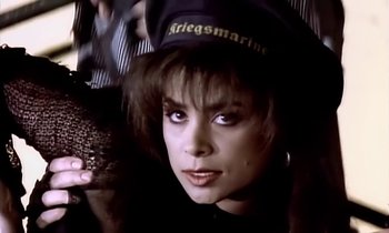 Movie still from “Paula Abdul - Cold Hearted” (1989), directed by David Fincher – Close Up shot, High angle