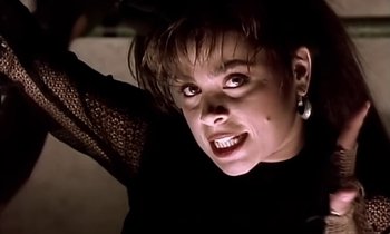 Movie still from “Paula Abdul - Cold Hearted” (1989), directed by David Fincher – Close Up shot, Low angle