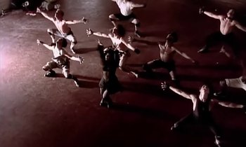 Movie still from “Paula Abdul - Cold Hearted” (1989), directed by David Fincher – Wide shot, High angle