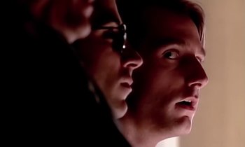 Movie still from “Paula Abdul - Cold Hearted” (1989), directed by David Fincher – Extreme Close Up shot, Over the shoulder angle