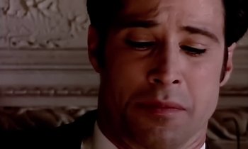 Movie still from “Paula Abdul - Cold Hearted” (1989), directed by David Fincher – Extreme Close Up shot, Over the shoulder angle