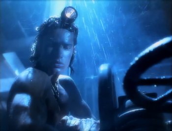 Movie still from “Madonna - Express Yourself” (1989), directed by David Fincher – Close Up shot, Low angle