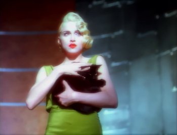 Movie still from “Madonna - Express Yourself” (1989), directed by David Fincher – Medium shot, High angle