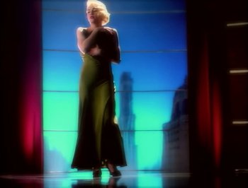Movie still from “Madonna - Express Yourself” (1989), directed by David Fincher – Wide shot, Low angle