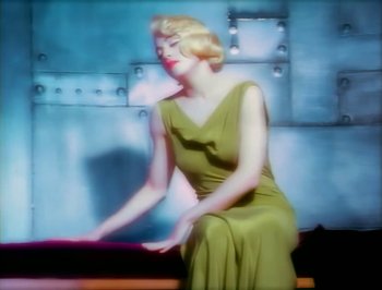 Movie still from “Madonna - Express Yourself” (1989), directed by David Fincher – Medium shot, Low angle